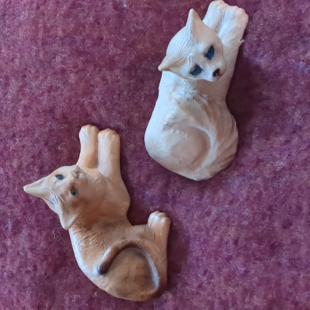 Leather wrapped ceramic cat figurines